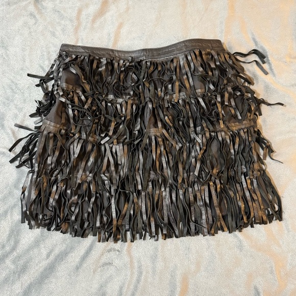 Zara Black Fringe Mini Skirt

#1157 - Picture 1 of 8